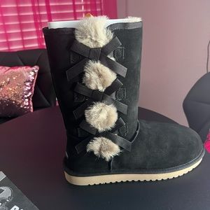 Brand new pair of UGG boots size 10.